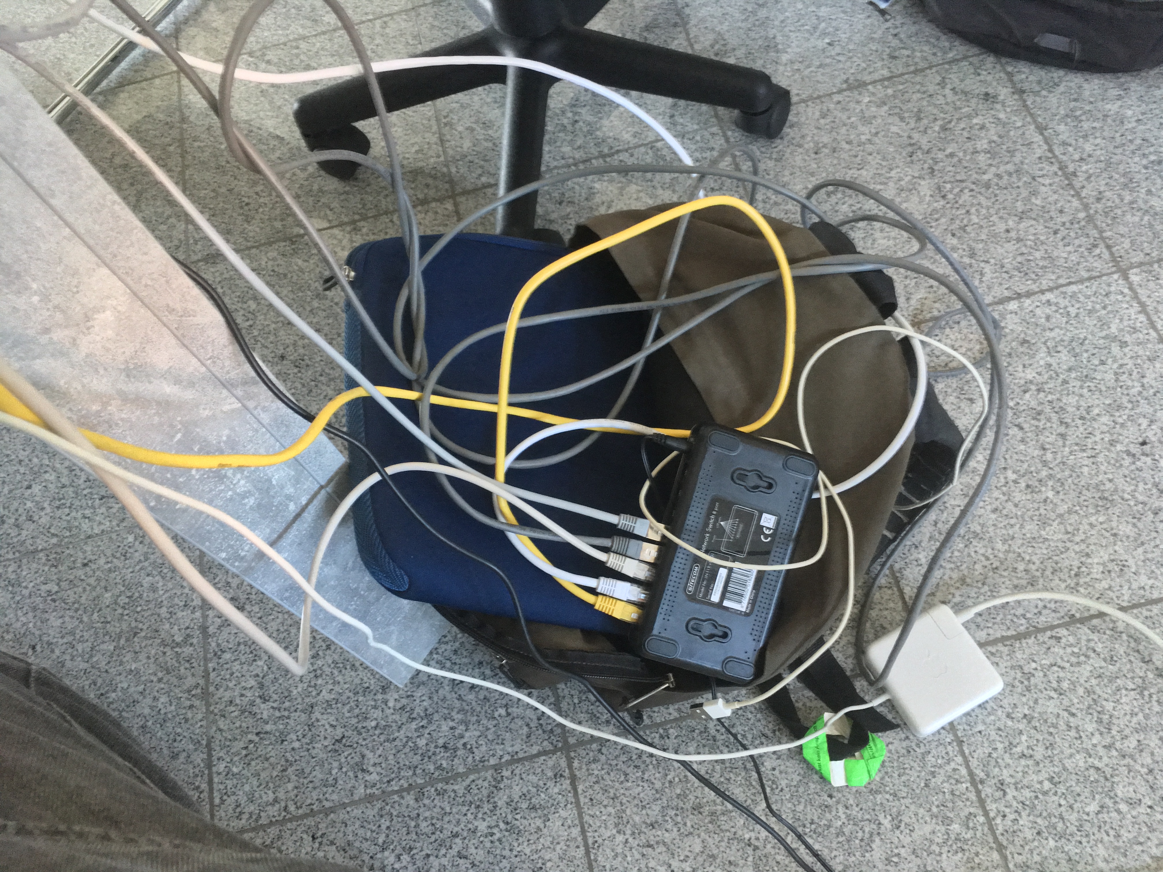 A bunch of network cables connected to a switch